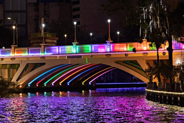 Colorful lights old bridge in Melaka old town over Melaka river at night Malaysia