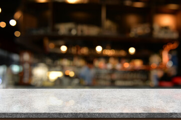 Empty white marble stone table top and blur interior cafe and restaurant.	
