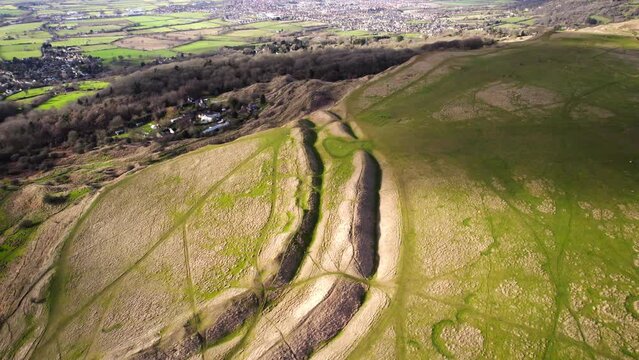 Aerial view of Cleeve Hill Iron Age Hillfort ramparts and ditches