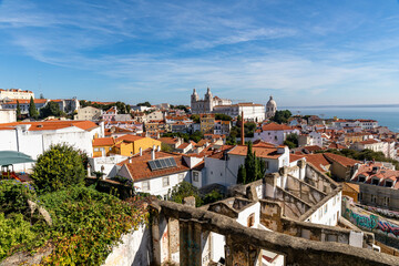 Naklejka na ściany i meble Roofs of Alfama, Monastery of Sao Vicente de Fora, Royal Pantheon, Lisbon, Portugal