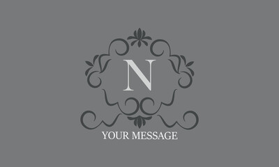 Vintage luxury initial letter N logo. Calligraphic emblem and elegant decor elements. Vector monogram