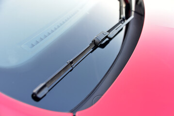 Wiper on the front windshield of a passenger car