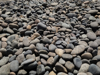 pile of smooth round shaped sea stones