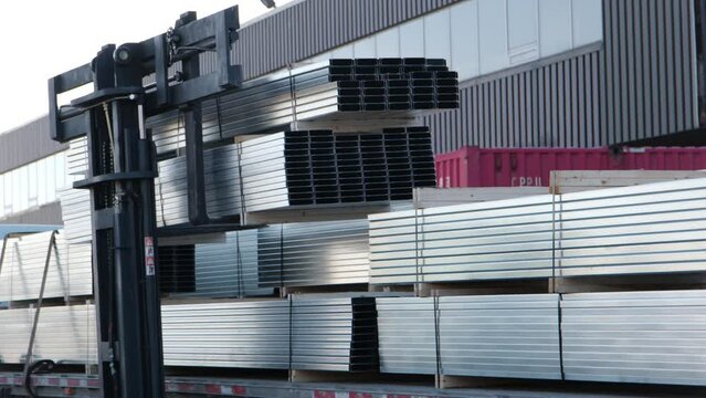 Metal stud for Wall framing loaded onto truck with forklift