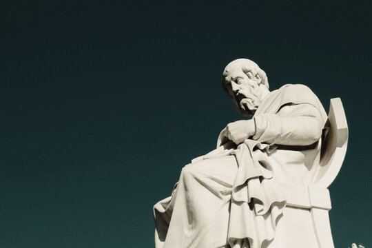 Statue of the ancient Greek philosopher Plato in Athens, Greece.