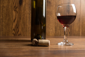 Bottle for wine with a glass and corks