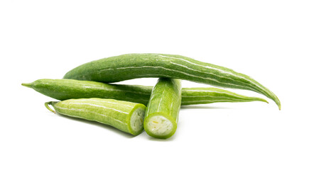 whole and slices fresh Snake gourd isolated on white background.