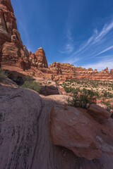 hiking the chesler park loop trail in the needles in canyonlands national park, usa
