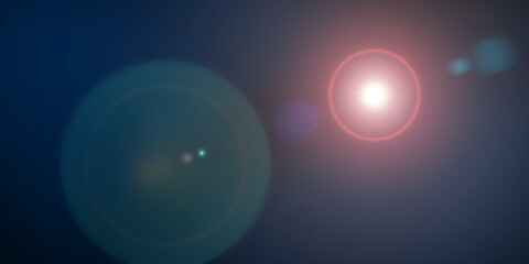 Intense blue lens flare overlay texture with bokeh effect on black background panorama banner. High quality photo