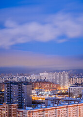 Obraz premium Winter evening cityscape of the city on a long exposure