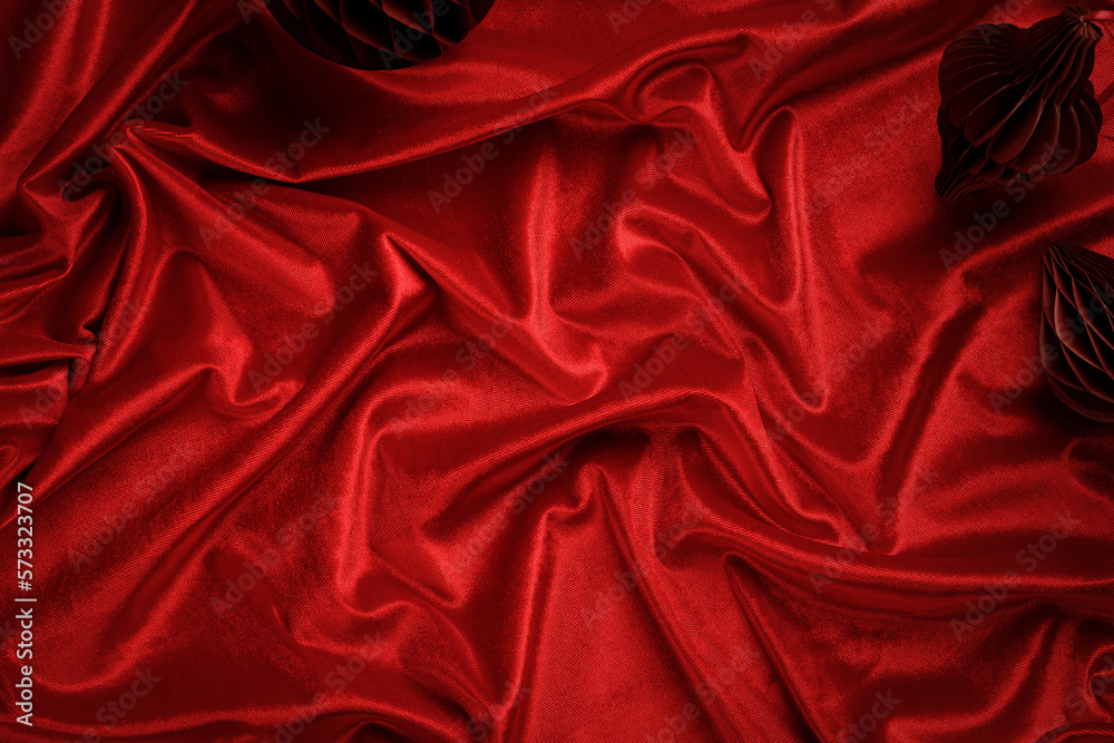 Wall mural dark red velvet textured draped background. beautiful wavy, soft surface of the fabric. christmas an