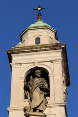 Fototapeta na wymiar Medieval sculpture of a saint, cloister gallery of the Chiesa di San Marco, Bergamo.