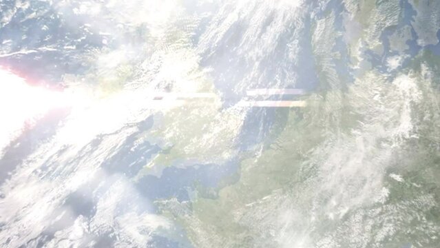 Earth zoom in from outer space to city. Zooming on Ely, United Kingdom. The animation continues by zoom out through clouds and atmosphere into space. Images from NASA