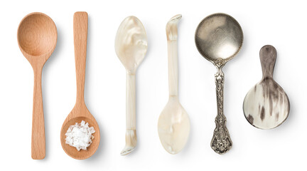 set of different spoons, wooden, mother-of-pearl, silver and horn ones, isolated food, cosmetics or lifestyle design elements, top view / flat lay