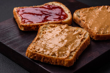 Nutritious sandwiches consisting of bread, raspberry jam and peanut butter