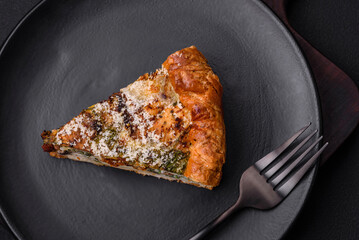 Delicious quiche with chicken, cheese, herbs, spices and herbs