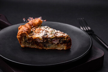 Delicious quiche with chicken, cheese, herbs, spices and herbs