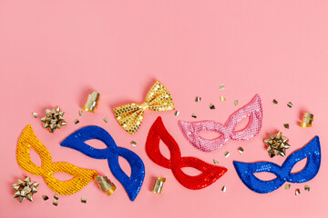 Multicolored carnival mask on blue background. Purim.