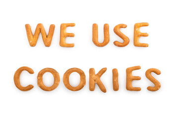 We use cookies caption made from tea cookies alphabet on a white background. Concept template for design of your website.
