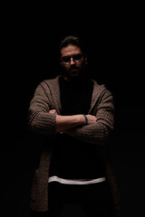 fashion model crossing arms at his chest