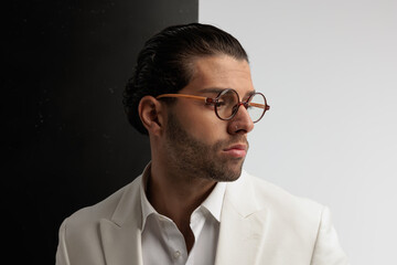 businessman looking to the side and posing