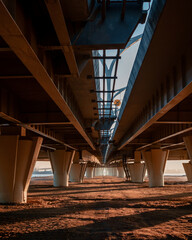Under the bridge at sunset