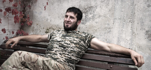 Portrait of a soldier on the bench