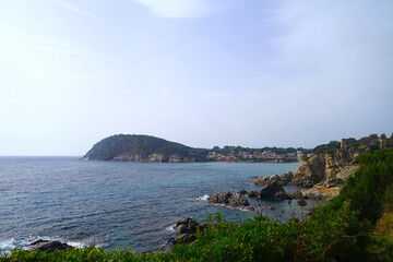 view from the hiking trail Camí de Ronda past the Castell De Sant Esteve towards the bay Cala de la Fosca, Catalonia, Costa Brava, Girona, Spain