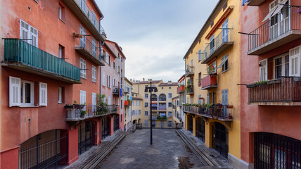 Fototapeta na wymiar Residential Apartment Homes in Old Nice, France. Sunny Fall Season Cloudy Sky.