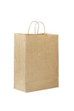 Paper bag. Kraft paper shopping bag. Brown folded paper bag with handle. Isolated on on a transparent background