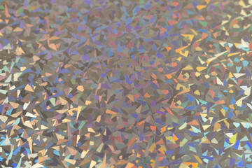 silver rainbow holographic foil texture, colorful hologram surface.