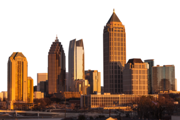 Atlanta Georgia skyline in sunset light with cut out sky.