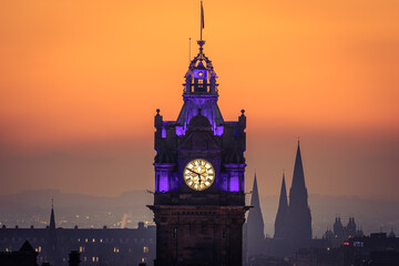 Fototapeta na wymiar Edinburgh's Balmoral Hotel clock tower at sunset 