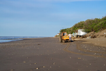 Reclaiming the Coastline: Tractor-Powered Cleanup for a Greener Beach