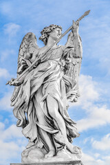 Rome, Italy: Statue of an Angel with the Lance by Domenico Guidi on Sant'Angelo Bridge in front of...