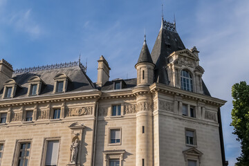 Architectural details of old buildings in Paris: The Criminal Court of Paris (Tribunal Correctionnel) located at the Palais de Justice at 14 Quai Goldsmiths. Paris. France.