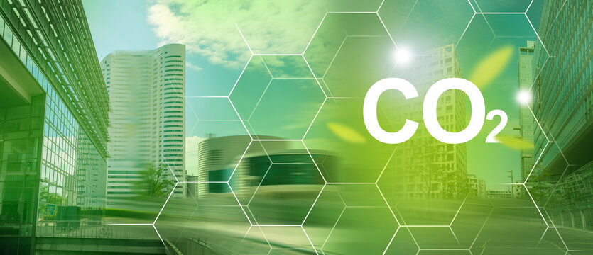 Problems and solutions of CO2 emission. Urban landscape blurry background, city making future clean.