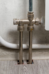 brass chrome-plated tee installed in the radiator