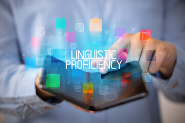 Young man holding a foldable smartphone