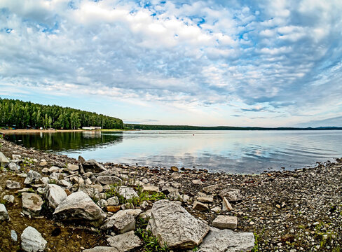 rocky shore of the lake in the morning