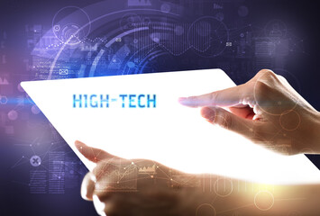 Hand holdig futuristic tablet , technology concept
