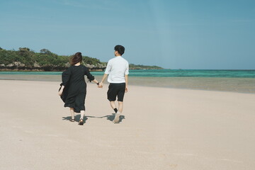 couple walking on the beach