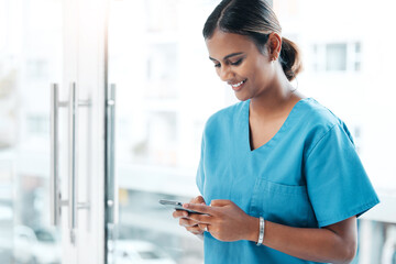 Phone, nurse and healthcare woman typing online for advice on life insurance and health website. Medical surgeon or doctor and smartphone writing communication, virtual consultation and research
