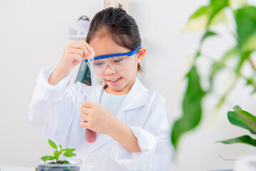 Asia little girl science