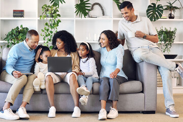 Big family, home and laptop on couch learning with online education, games or movie. Parents, grandparents and children relax together in lounge with internet for quality time streaming and bonding