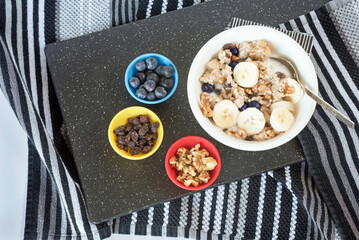 Cooked Oatmeal with Blueberries, Raisins, Walnuts and Bananas