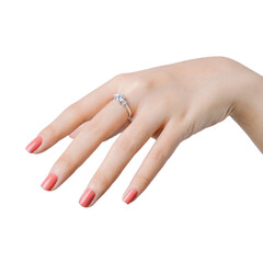 Close up fingers of woman with pink polished nails wearing an expensive engagement diamonds ring.