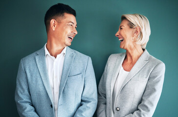 Mockup, business people and laughing team in studio for fun and happy conversation or comedy on green background.Partnership and man with senior woman with humor, joke or discussion while isolated - obrazy, fototapety, plakaty