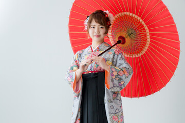 kimono in woman 袴を着て番傘を持つ女性 