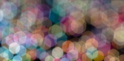 Multicolored festive bokeh as background.
